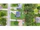 Aerial view of the home with the fenced backyard with firepit and screened in porch at 341 Jodeco Station E Cir, Stockbridge, GA 30281