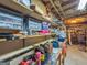 Organized basement workspace with shelving, tools, and a workbench for DIY projects and storage at 341 Jodeco Station E Cir, Stockbridge, GA 30281