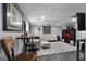 Living area showcasing a finished basement with modern furniture and decor at 341 Jodeco Station E Cir, Stockbridge, GA 30281
