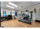 Finished basement with home gym, desk, and multiple storage options at 341 Jodeco Station E Cir, Stockbridge, GA 30281