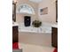 This bathroom has a soaking tub with a plant and a window above it for natural light at 341 Jodeco Station E Cir, Stockbridge, GA 30281