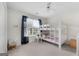 This bedroom features a bunk bed, carpeted floors, and a window for natural light at 341 Jodeco Station E Cir, Stockbridge, GA 30281