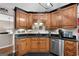 Well-equipped kitchen featuring stainless steel appliances, granite counters, and ample cabinet space at 341 Jodeco Station E Cir, Stockbridge, GA 30281