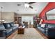 Bright living room with hardwood floors, stylish decor, and comfortable furniture arrangement at 341 Jodeco Station E Cir, Stockbridge, GA 30281
