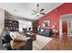 Cozy living room showcasing hardwood floors, comfortable seating, and a well-lit interior at 341 Jodeco Station E Cir, Stockbridge, GA 30281