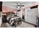 Charming bedroom with pink walls, a ceiling fan, wardrobe, and decor at 341 Jodeco Station E Cir, Stockbridge, GA 30281