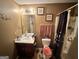 Functional bathroom featuring a shower, vanity, and neutral decor at 4466 Estate St, South Fulton, GA 30349
