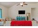 Bright living room features vaulted ceiling, comfortable seating and modern decor at 697 Emporia Loop, Mcdonough, GA 30253
