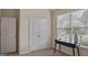 Bright office space featuring a modern desk, natural light, and calming neutral decor at 697 Emporia Loop, Mcdonough, GA 30253