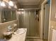 Classic bathroom with shower and vanity at 7111 Indian Creek Sw Cir, Covington, GA 30014