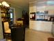 Updated kitchen with stainless steel appliances and tile backsplash at 7111 Indian Creek Sw Cir, Covington, GA 30014