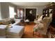 Inviting living room with hardwood floors and classic furnishings at 7111 Indian Creek Sw Cir, Covington, GA 30014
