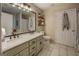 This bathroom features double vanity, white tile flooring and lots of space at 160 Laurel Ln, Social Circle, GA 30025