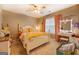 Neutral bedroom with lots of decor, natural lighting and a ceiling fan at 160 Laurel Ln, Social Circle, GA 30025