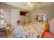 Neutral bedroom with TV, desk and queen sized bed at 160 Laurel Ln, Social Circle, GA 30025