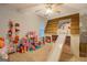 Unique bedroom with built in playhouse and slide at 160 Laurel Ln, Social Circle, GA 30025