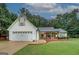 Charming single-Gathering home features a well-maintained lawn and inviting front porch at 160 Laurel Ln, Social Circle, GA 30025