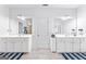 Spacious bathroom with double vanity sinks, tile flooring, and well-lit mirrors, perfect for busy mornings at 412 Culloden Moor, Mcdongough, GA 30253