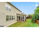 This home features a spacious, enclosed porch and well-kept lawn at 412 Culloden Moor, Mcdongough, GA 30253