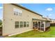 This home features a spacious, enclosed porch and well-kept lawn at 412 Culloden Moor, Mcdongough, GA 30253