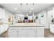 Bright kitchen island with granite countertops and stylish pendant lighting at 412 Culloden Moor, Mcdongough, GA 30253