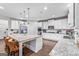 Well-equipped kitchen with stainless steel appliances, granite countertops, and a central island with seating at 412 Culloden Moor, Mcdongough, GA 30253