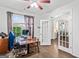 Bright office with hardwood floors and natural light, view into living room at 412 Culloden Moor, Mcdongough, GA 30253