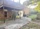 Backyard with covered deck and brick patio at 984 Morrow Rd, Morrow, GA 30260