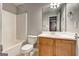 Bathroom featuring a tub/shower combination, light wood vanity and modern fixtures at 4862 Park Cir, Atlanta, GA 30349