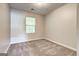 A cozy bedroom with carpet and a large window, perfect for relaxation and rest at 4862 Park Cir, Atlanta, GA 30349