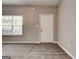 Entryway featuring stylish wood-look flooring transition to the living area at 4862 Park Cir, Atlanta, GA 30349