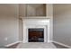 Cozy fireplace with a decorative white mantel and marble hearth at 4862 Park Cir, Atlanta, GA 30349