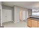 Bright kitchen with lots of cabinet space and tile floors and bar top at 4862 Park Cir, Atlanta, GA 30349
