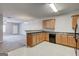 Kitchen area with stainless steel sink, stone countertops, and tile floors at 4862 Park Cir, Atlanta, GA 30349