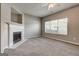 Bright living room offering neutral paint, carpeted floors, and a cozy fireplace at 4862 Park Cir, Atlanta, GA 30349