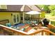 Charming backyard deck featuring outdoor furniture, perfect for enjoying a relaxing outdoor lifestyle and dining at 6830 Peeksville Rd, Mcdonough, GA 30252