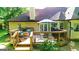 Beautiful backyard deck with outdoor seating is a perfect place to enjoy nature with a grill for outdoor cooking at 6830 Peeksville Rd, Mcdonough, GA 30252