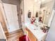 Bathroom with a single sink, toilet, and wood-look flooring at 6830 Peeksville Rd, Mcdonough, GA 30252