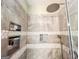Modern bathroom boasts frameless glass shower with dual shower heads and updated fixtures at 6830 Peeksville Rd, Mcdonough, GA 30252