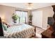Cozy bedroom with a bed, closet and abundant natural light from the window at 6830 Peeksville Rd, Mcdonough, GA 30252
