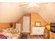 Cozy bonus room featuring hardwood floors, and ample storage space at 6830 Peeksville Rd, Mcdonough, GA 30252