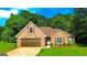 Charming brick home featuring an attached garage, manicured lawn, and mature trees in a desirable neighborhood at 6830 Peeksville Rd, Mcdonough, GA 30252