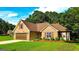 Charming brick home with a two-car garage, complemented by a beautifully landscaped yard at 6830 Peeksville Rd, Mcdonough, GA 30252