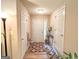 Inviting foyer featuring neutral walls, hardwood floors, and a welcoming front door at 6830 Peeksville Rd, Mcdonough, GA 30252