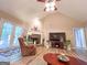 Charming living room with stone fireplace, French doors, and a comfortable recliner at 6830 Peeksville Rd, Mcdonough, GA 30252