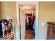 Well-organized walk-in closet with ample hanging space and shelving for storage at 6830 Peeksville Rd, Mcdonough, GA 30252