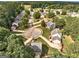 Aerial view featuring homes on a tree-lined cul-de-sac at 1600 Coal Shovel Ne Trl, Conyers, GA 30013