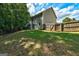 Spacious backyard featuring a wooden fence at 1600 Coal Shovel Ne Trl, Conyers, GA 30013