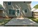 Back of house with a concrete patio at 1600 Coal Shovel Ne Trl, Conyers, GA 30013