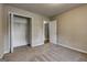 Spacious bedroom features carpet floors and a closet with shelving, freshly painted at 1600 Coal Shovel Ne Trl, Conyers, GA 30013